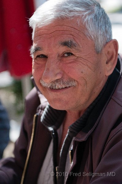 20100406_115536 D300.jpg - Man playing backgammon, Mustafapasa